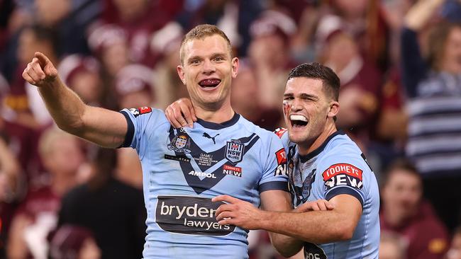 Tom Trbojevic and Nathan Cleary celebrate during NSW’s win over Queensland. Picture: Getty Images