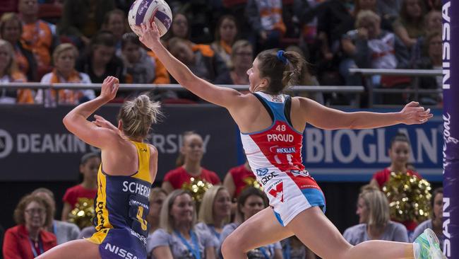 Maddy Proud at full stretch against Sunshine Coast Lightning at Qudos Bank Arena last year. 