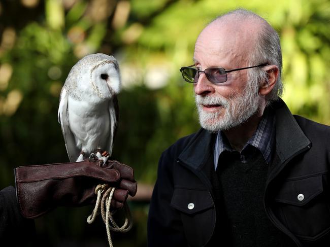 01/06/17 Graham Medlin from the South Australian Museum who leads a project sifting through barn owl droppings to find clues to what small animals are in a region. Graham at the Adelaide Zoo with Cooper the barn owl. photo Calum Robertson