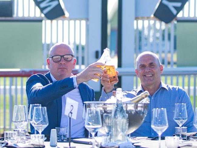 Brad Fanning (suit and Brad Morgan sponsorship announcement at turf club re Darwin cup. Picture Glenn Campbell