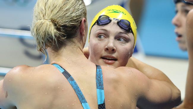 Australia’s Cate Campbell is consoled by competitors after finishing sixth. Picture: Brett Costello