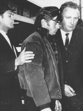 John Michael Farnsworth (centre) was sentenced to death for the murder of Thomas and Sheila Reed.