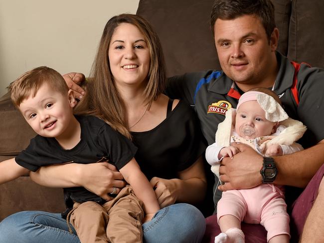 5/4/19 - Moneysaver HQ - Mother-of-two Justine Gatt, 29, with partner Buddy Isbister with their two children Levi, 3, and Saydi, 3 months, live in a three-bedroom home in Brookfield near Melton in Victoria. They have recently refinanced her mortgage and have saved a fortune in interest charges, dropping from an interest rate of above 7.6 down to 3.8 per cent. Photo - Naomi Jellicoe