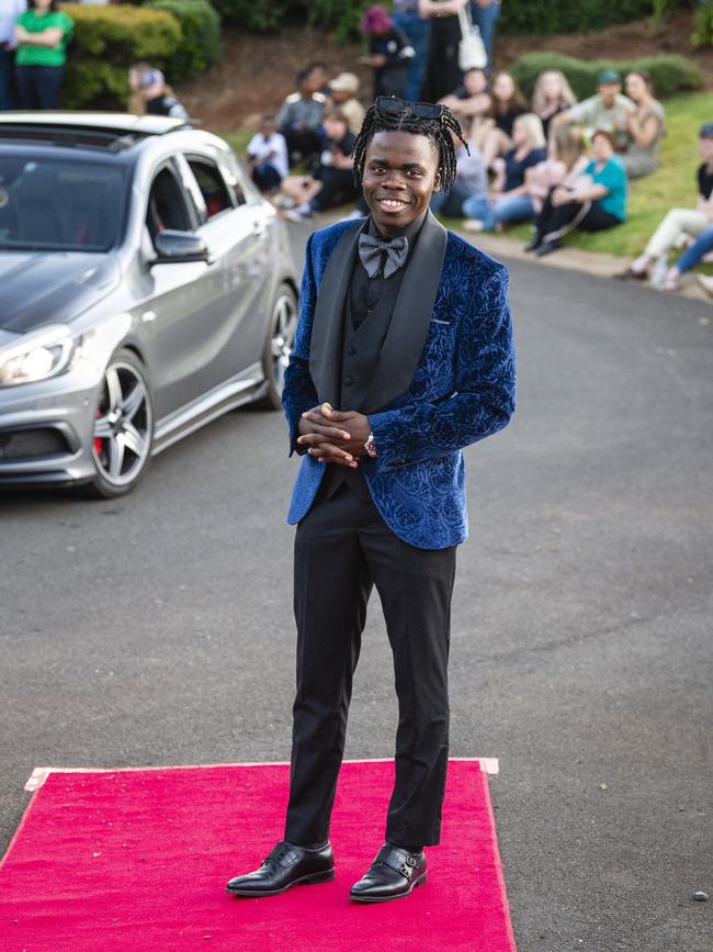 Aristide NSabe arrives at Harristown State High School formal at Highfields Cultural Centre, Friday, November 18, 2022. Picture: Kevin Farmer