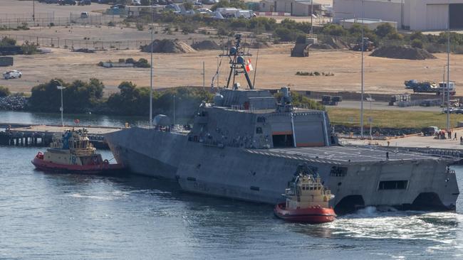 In April this year tugboats push the Independence-variant littoral combat ship USS Canberra (LCS 30) to a pier at Naval Air Station, North Island, prior to a routine underway off the California Coast. Picture: Mark D. Faram