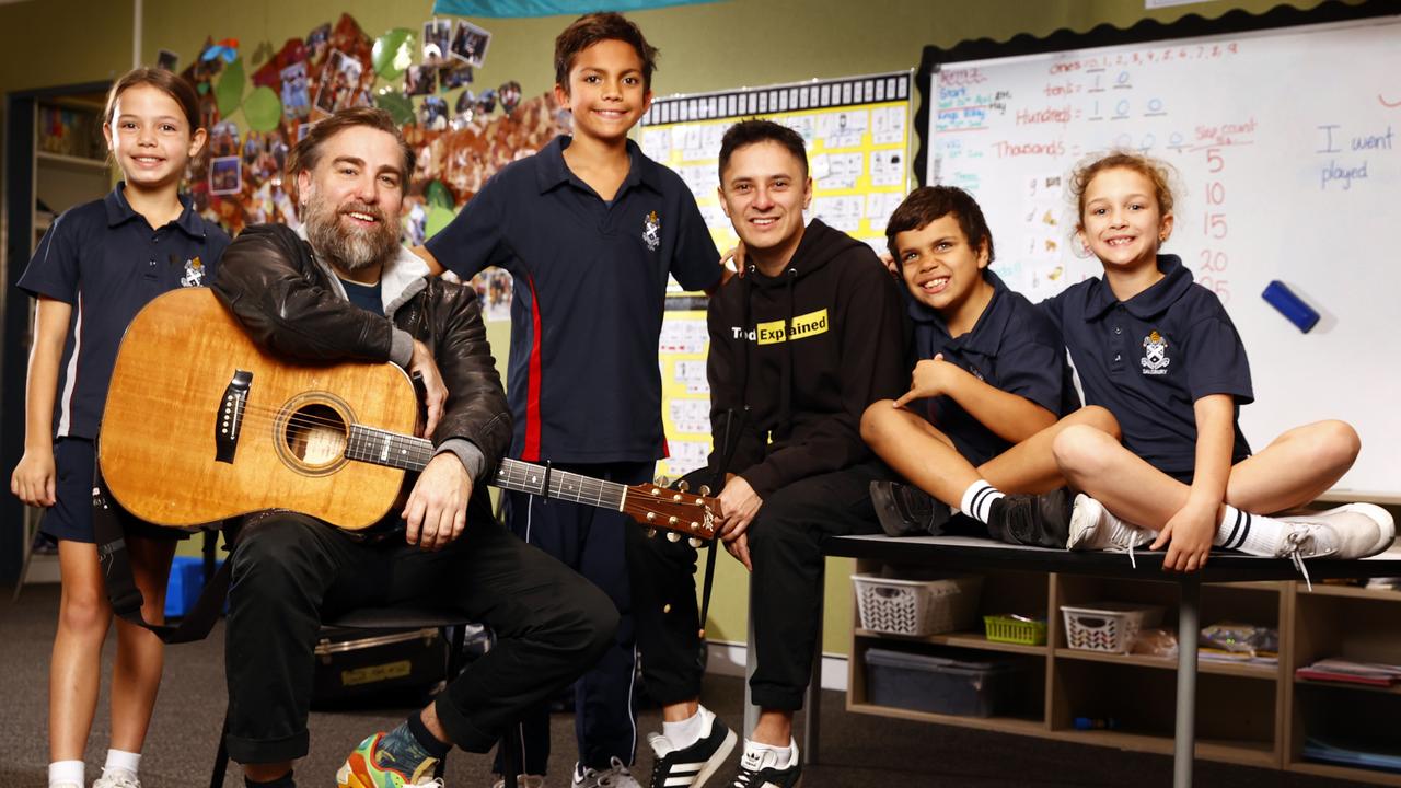 Australian singer-songwriter Josh Pyke and Indigenous Hip Hop artist Rhyan Clapham (DOBBY) with students Samara Lyons, Marlon Coulthard, Shane Jackson and Bokhara Rossiter from St Andrew’s Cathedral Gawura School in Sydney. Picture: Richard Dobson