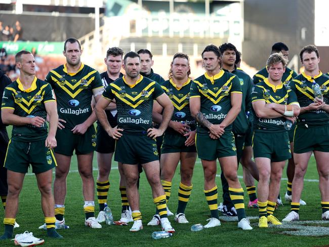 Dejected Kangaroos players after the loss to New Zealand. Picture: Phil Walter/Getty Images