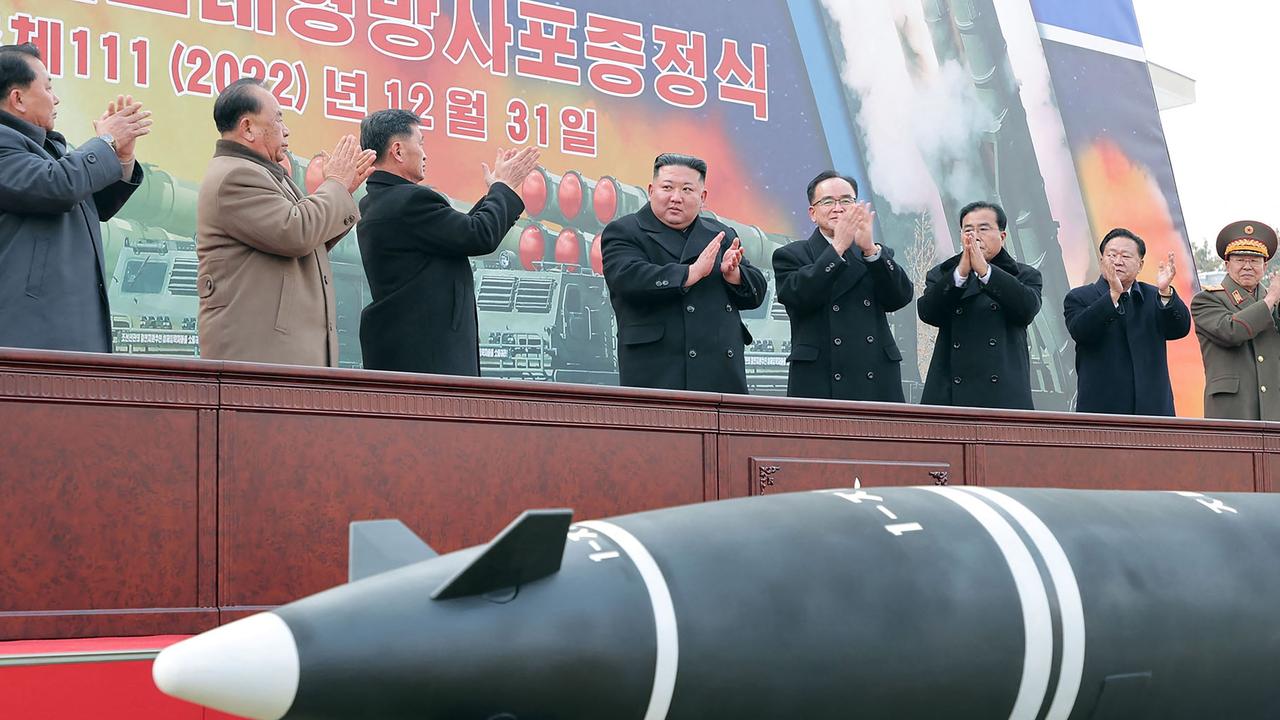 This picture released on January 1 shows North Korean leader Kim Jong-un attending a ceremony of donating 600mm super-large multiple launch rocket system in Pyongyang. Picture: KCNA via KNS/AFP