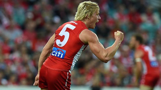 Isaac Heeney of the Swans gestures after kicking a goal during the round 7 AFL match between the Sydney Swans and the Essendon Bombers at the Sydney Cricket Ground, in Sydney, Saturday, May 7, 2016. (AAP Image/Dan Himbrechts) NO ARCHIVING, EDITORIAL USE ONLY