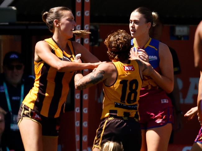 MELBOURNE, AUSTRALIA - NOVEMBER 10: Players wrestle after the final siren during the 2024 AFLW Second Qualifying Final match between the Hawthorn Hawks and the Brisbane Lions at IKON Park on November 10, 2024 in Melbourne, Australia. (Photo by Michael Willson/AFL Photos via Getty Images)