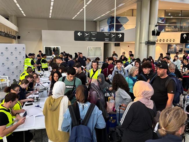 Australian Government officials assisting Australians to depart Lebanon on two government-supported charter flights from Beirut Airport to Larnaca, Cyprus on Saturday 5 October 2024. Picture: DFAT