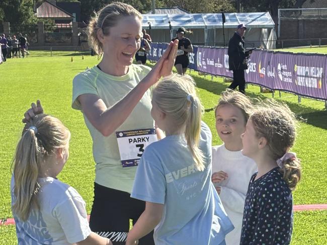 Downhill pain, uphill gain: Locals defend Toowoomba marathon crowns