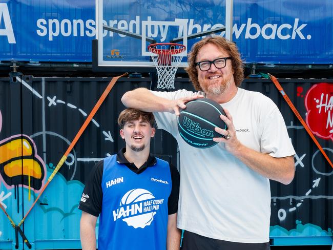 DAILY TELEGRAPH. Australian NBA legend Luc Longley was in Sydney to promote Hahn beerÃs half court outdoor bar & basketball court at the entertainment quarter, Moore Park. Picture shows Luc with Hoops Capital Program player Mitchell Watson. 11/02/2024. Picture by Max Mason-Hubers