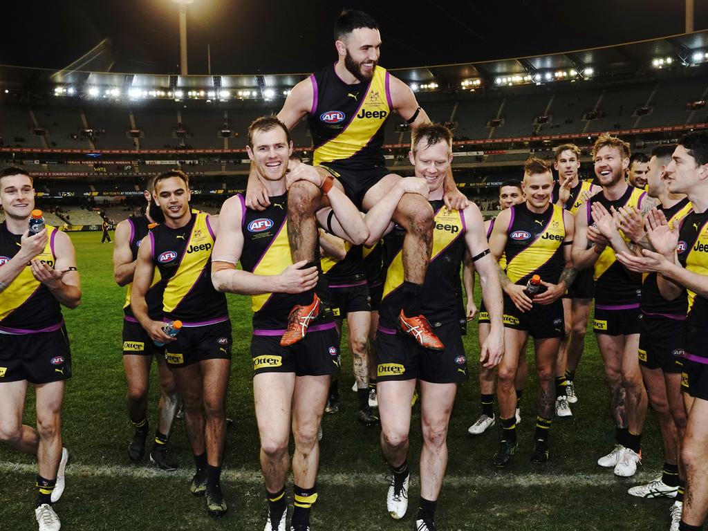 Shane Edwards of the Tigers is carried off after his 250th match in which he dominated for his owners in SuperCoach