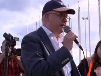 Anthony Albanese speaking at the rally with Sarah Williams behind him. Picture: Instagram/What Were You Wearing