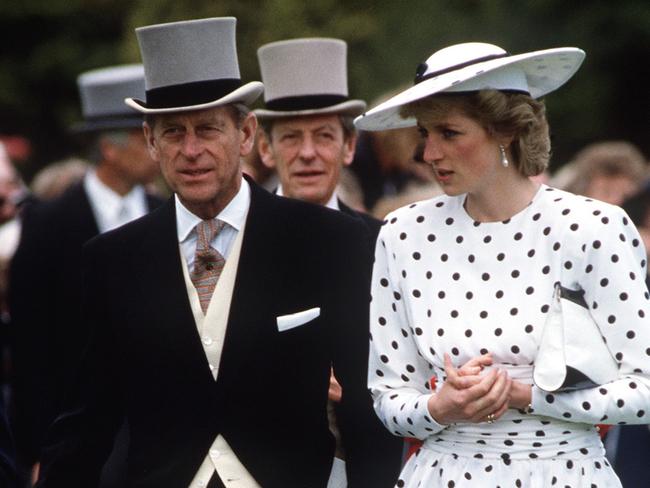 The late Princess Diana with Prince Philip in happier times at Epsom in Surrey. Picture: Getty