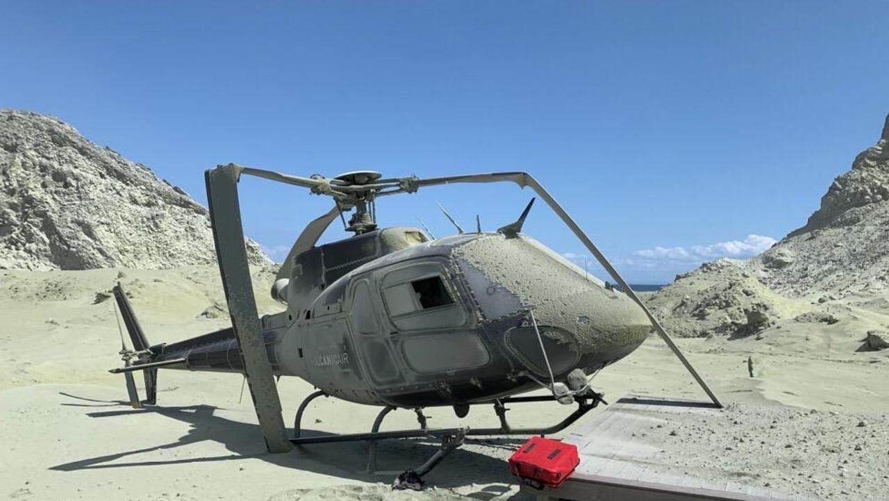 A damaged helicopter on White Island after the volcanic eruption. Picture: Instagram/The Helicopter Page