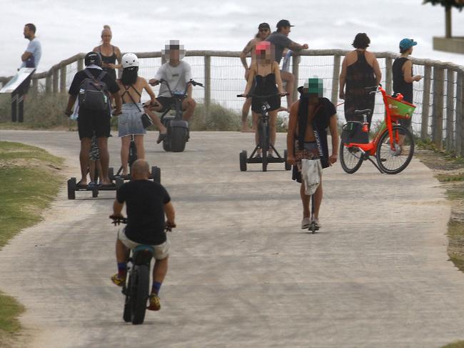 A variety of two-wheeled vehicles using the footpath at Narrowneck. Picture: Tertius Pickard