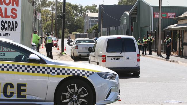 Police interview employees at the scrap metal yard in 2021. Picture: Emma Brasier