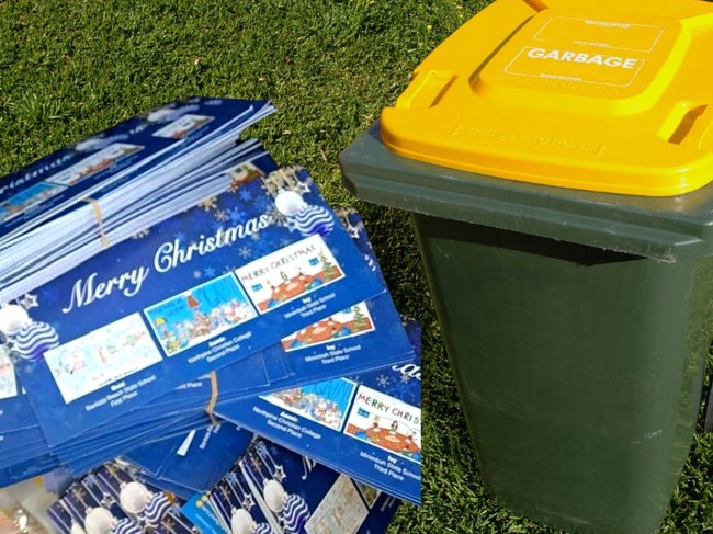 Christmas cards dumped in in bin. Picture: Supplied