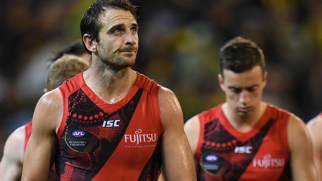 Jobe Watson walks off the MCG after the loss to Richmond. Picture: AAP