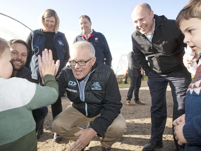 Prime Minister Scott Morrison and Treasurer Josh Frydenberg during the visit to Hillwood Berries in Northern Tasmania. Picture: Chris Kidd