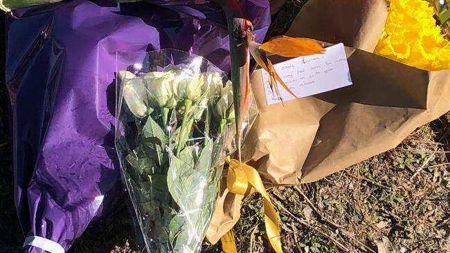 Flowers left at the crash scene in memory of Barney Wakes-Miller, 17, of Oxford Falls, who died in a road accident at Elanora Heights on Saturday night. Picture: Supplied