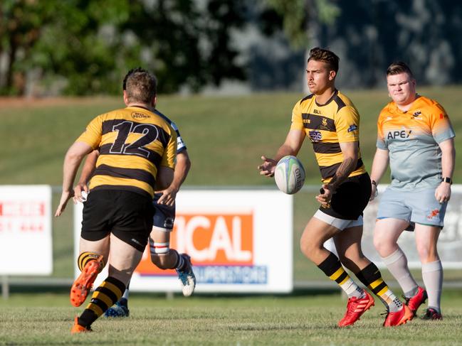 Fly-half Braden Cunningham passing the ball off to Drew Tobin, who has returned after missing much of last season with injury. Picture: Che Chorley