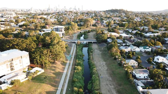 Stunning drone imagery shows dozens of cyclists using the Kedron Brook Bikeway in what its photographer believes will become an "historical document" illustrating how the COVID-19 pandemic helped us rediscover our love of walking and cycling. Picture: Supplied