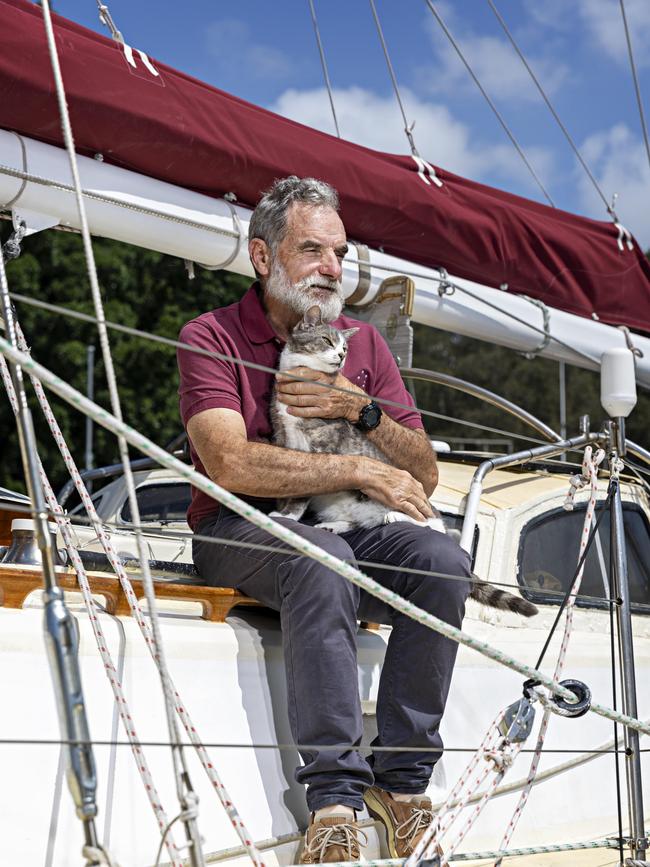 SYDNEY, AUSTRALIA, NOVEMBER 22, 2023. Sylph VI skipper and owner Robert â€˜Bobâ€™ Williams with his cat Oli who will sail with Bob in the Sydney to Hobart yacht race on board Sylph VI. Photographer: Adam Yip