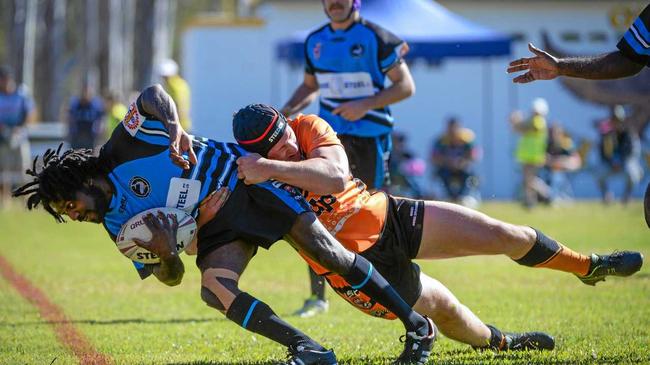 Avondales Blake Andrew Santalucia tackles Graham Jones. Picture: Brian Cassidy