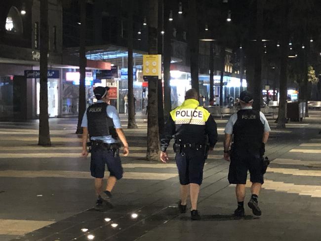 Police officers on foot patrol on The Corso at Manly had to separate the two groups of brawlers. File picture: Jim O'Rourke