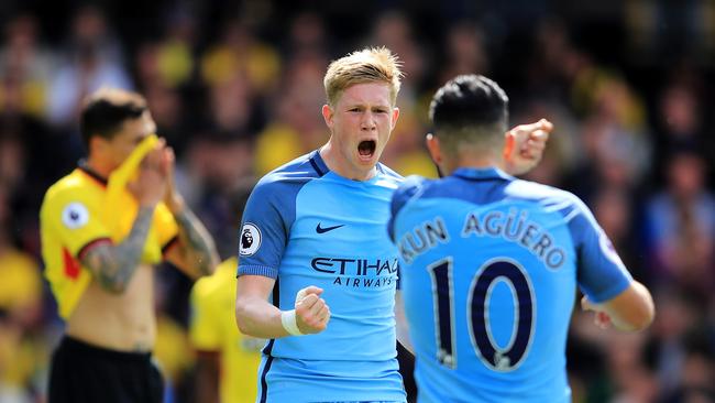 WATFORD, ENGLAND - MAY 21: Sergio Aguero of Manchester City celebrates scoring his sides second goal with Kevin De Bruyne