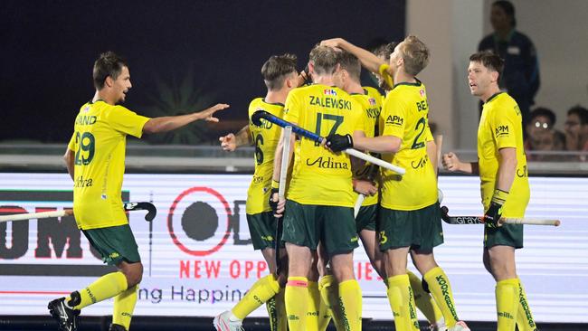 Australia celebrate after a goal against Argentina. (Photo by WorldSportPics/Frank Uijlenbroek)