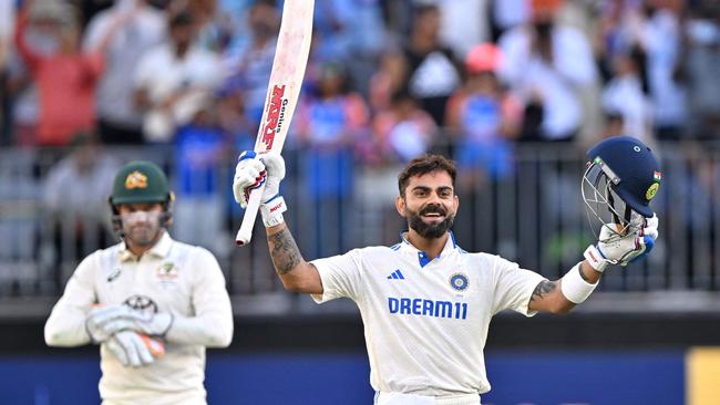 Virat Kohli celebrates reaching his century before Inida declared to set Australia a huge run-chase. Picture: AFP