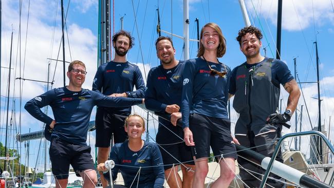 Jessica Watson and her crewmates ahead of the Sydney to Hobart start. Picture: Justine Lloyd.