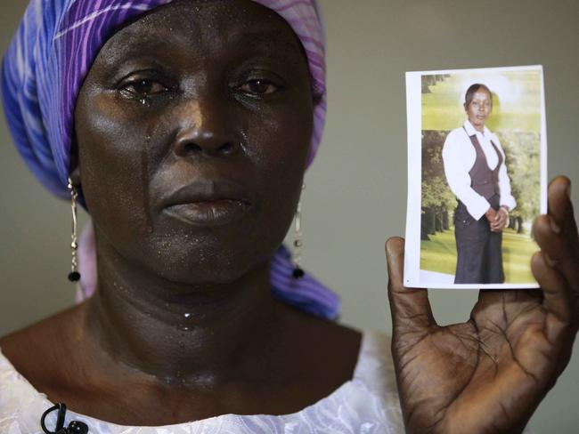 Mother’s heartbreak ... Martha Mark, the mother of kidnapped schoolgirl Monica Mark, cries for her daughter. Picture: AP Photo/Sunday Alamba