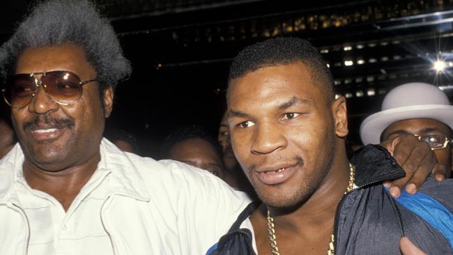 Promoter Don King and athlete Mike Tyson attend Sugar Ray Leonard Vs. Donny LaLond Boxing Match on November 7, 1988 at Caesar's Palace in Atlantic City, New Jersey. (Photo by Ron Galella, Ltd./WireImage)