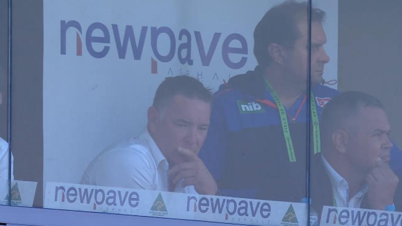 Adam O'Brien sits alongside Anthony Seibold