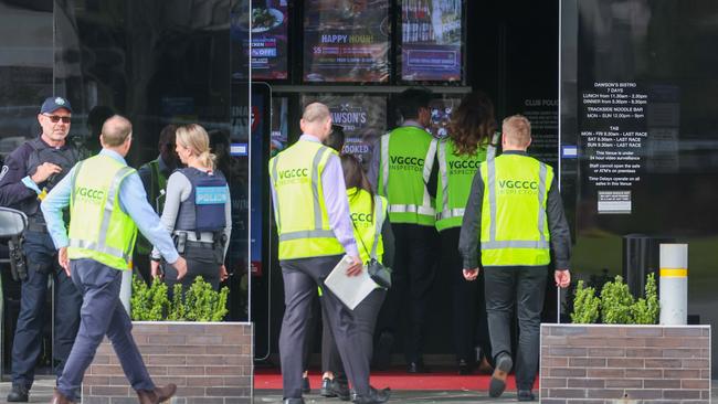 Police raid Greyhounds Entertainment in Springvale. Picture: Brendan Beckett