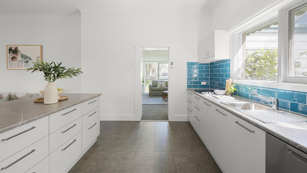 The kitchen has ample storage.