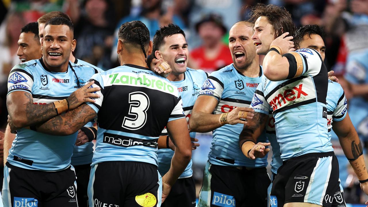 The Sharks celebrate a try. (Photo by Hannah Peters/Getty Images)