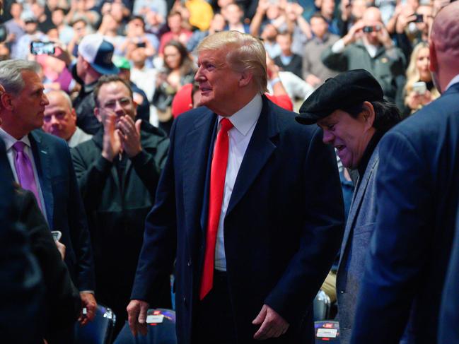 US President Donald Trump (C) next to Panamanian boxer Roberto Duran (R) arrives to attend the Ultimate Fighting Championship in New York. Picture: AFP