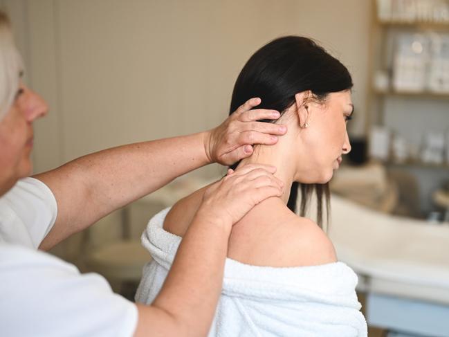 She developed double vision, tingling in her hand and foot and vomited after one adjustment. Picture: iStock