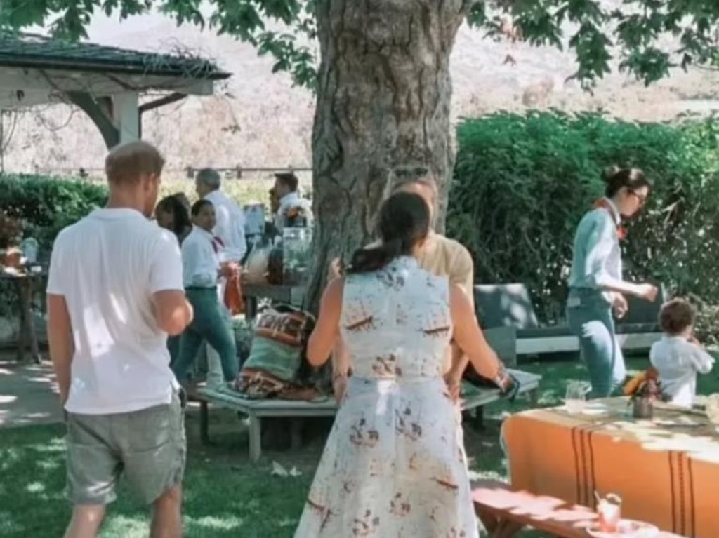 Prince Harry and Meghan Markle at the barbecue. Picture: Instagram