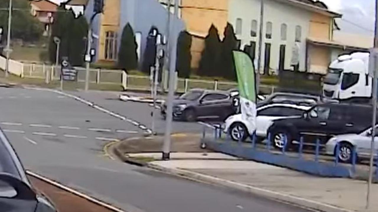 The moment of the collision when children allegedly driving a stolen car blocked out a lane of traffic. Still taken from Dash Cam Owners Australia.