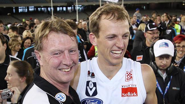 North Ballarat Roosters coach Gerard Fitzgerald (left) and captain Shaun Maloney after claiming the VFL flag. Picture: Michael Klein.