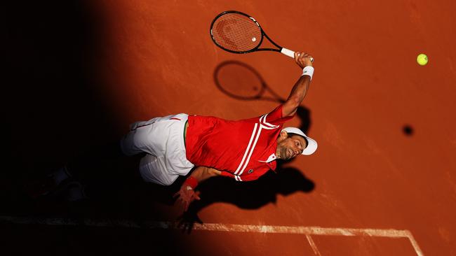 Novak Djokovic serves during the French Open men’s singles final. Picture: Getty Images