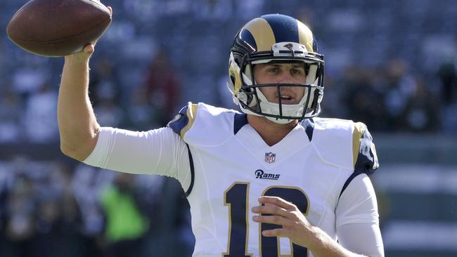 Los Angeles Rams quarterback Jared Goff (16) warms up before an