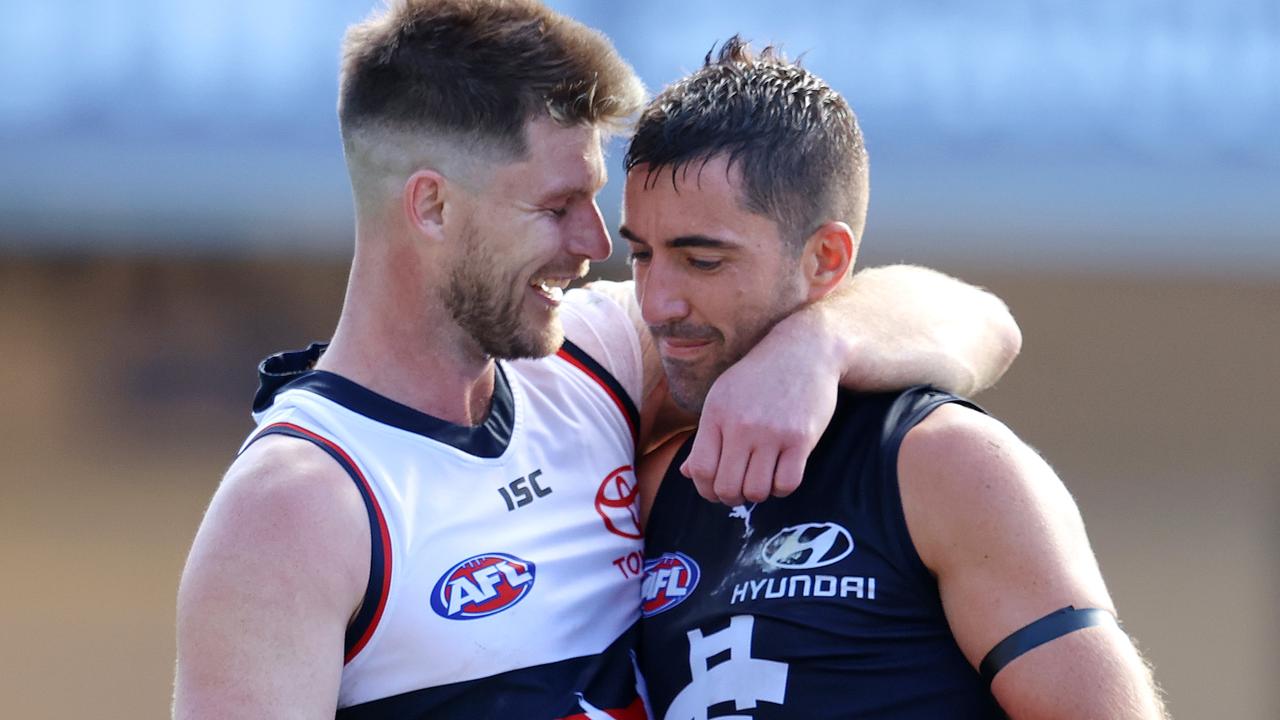 Bryce Gibbs of the Crows and former teammate Kade Simpson of the Blues after Gibbs announced his retirement. Picture: Michael Klein